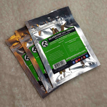 Load image into Gallery viewer, 3 vacuum sealed packages of Silvervine Cat Treats with a green and black label on them laying on a off white background.