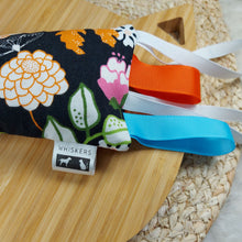 Load image into Gallery viewer, Black Catnip Floral Catnip Super Kicker Toy. Get those paws moving with this catnip toy! This is the purrrfect cat toy for your feline friends who love to lie down and get all four paws involved when they are playing with something they love. Add in some delectable catnip and crinkle paper that peaks their curiosity and this toy ticks all the boxes. Made from 100% cotton. Contains 1 Tablespoon of Catnip/Catmint from St Jacobs, Ontario, Canada. Wiggles and Whiskers Canada Pet Accessories.