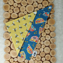 Load image into Gallery viewer, Dog bandana and cat bandana. This reversible bandana (size small) has happy bees on one side and colourful trailers under a starlit sky on the other. Wiggles & Whiskers. Pet Accessories Canada.