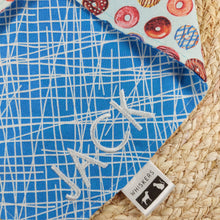 Load image into Gallery viewer, Embroidery Name Add On. Embroidered bandanas can be ironed if necessary as long as the iron is not placed directly on the stitched area. Available for custom order bandanas only. 7 Font choices and 10 thread colours available. Names are limited to a maximum of 15 characters in length. ‘Silky' Wiggles and Whiskers brand tag is located on the right side of the bandana. Please don't hesitate to contact us (megan@wigglesandwhiskers.ca) with any questions or requests. Wiggles and Whiskers Canada Pet Accessories.