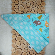 Load image into Gallery viewer, Dog banana and cat bandana. This bandana is fully reversible with two cheerful, coordinating, and turquoise fabrics with white arrows and small animals. Wiggles & Whiskers. Pet Accessories Canada.