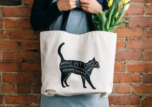 Load image into Gallery viewer, Cat & Dog Petting Double-Sided Eco-Tote Bag. This eco friendly tote bag displays a dog petting guide perfect for dog lovers. This sturdy, environmentally-friendly tote bag takes a playful spin on the traditional butcher print, and makes a stylish gift for the cat and dog lover in your life. Wiggles and whiskers Canada. Canadian pet accessories.