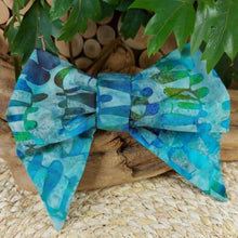 Load image into Gallery viewer, Ocean Bow Pet collar. Help your pup put their best paw forward by wearing one of these pretty bows on their collar. Worn to the side, up front or at the back, its versatility makes dressing up an everyday possibility! This collar bow is suitable as a cat collar and a dog collar. Measures 5.5” at its widest point. Made from 100% cotton fabric in a variety of patterns. Fastens to collars up to 1” wide. Elastic and snap fastener. Wiggles and Whiskers Canada Pet Accessories.