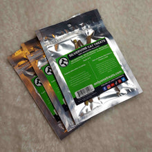 Load image into Gallery viewer, 3 vacuum sealed packages of Silvervine Cat Treats with a green and black label on them laying on a off white background. 
