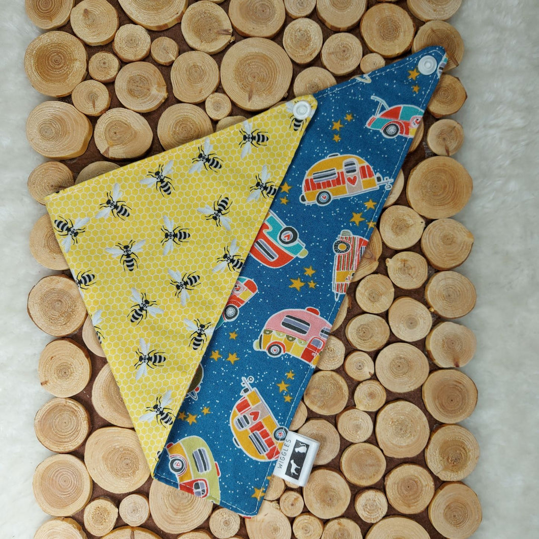 Dog bandana and cat bandana. This reversible bandana (size small) has happy bees on one side and colourful trailers under a starlit sky on the other. Wiggles & Whiskers. Pet Accessories Canada.