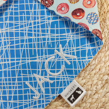 Load image into Gallery viewer, Embroidery Name Add On. Embroidered bandanas can be ironed if necessary as long as the iron is not placed directly on the stitched area. Available for custom order bandanas only. 7 Font choices and 10 thread colours available. Names are limited to a maximum of 15 characters in length. ‘Silky&#39; Wiggles and Whiskers brand tag is located on the right side of the bandana. Please don&#39;t hesitate to contact us (megan@wigglesandwhiskers.ca) with any questions or requests. Wiggles and Whiskers Canada Pet Accessories.
