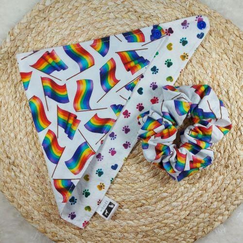 PRIDE month with this reversible pet bandana and matching hair scrunchie at one Special price! This Snap-On bandana is fully reversible with two coordinating 100% cotton fabrics. It falls in between a size small and medium and would best fit a pup with a neck circumference from 13.5