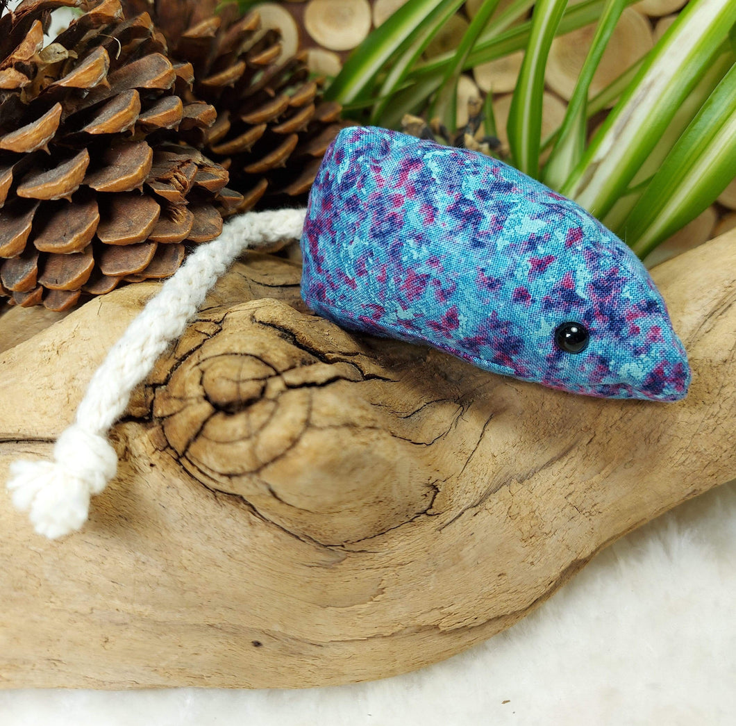 Kid Koolaid Mouse Pet Toy. Awaken your cat’s primal hunting genes with this cute mouse toy that will fly across the floor and make an enticing sound as they bat it around and chase after its wagging tail! Made from 100% cotton fabric (double stitched for durability) with cute beady black eyes. Each mouse is approximately 9