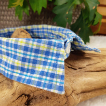 Load image into Gallery viewer, Blue/White Plaid Dapper Pet Collar. Your dog or cat will look “Oh so handsome” in a snap, with this simple, comfortable and stylish collar available in a variety of classic looks. This dog collar is suitable to be used as a cat collar. The neck size is 14.5 inches. Made of 100% cotton fabric. Fully washable, dryer friendly and can be ironed as needed. It is recommended that you allow an additional 2 finger widths space for ideal fit. Wiggles and Whiskers Canada Pet Accessories.
