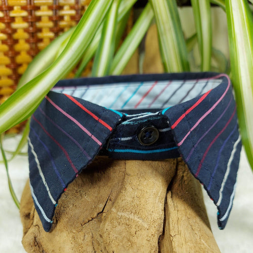 Navy Striped Dapper Pet Collar. Your dog or cat will look “Oh so handsome” in a snap, with this simple, comfortable and stylish collar available in a variety of classic looks. This dog collar is suitable to be used as a cat collar. The neck size is 14.5 inches. Made of 100% cotton fabric. Fully washable, dryer friendly and can be ironed as needed. It is recommended that you allow an additional 2 finger widths space for ideal fit. Wiggles and Whiskers Canada Pet Accessories.