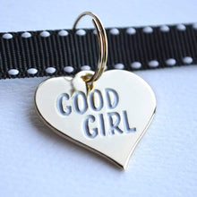 Load image into Gallery viewer, Gold Plated Good Girl Pet Tag. Who&#39;s a good girl? Your pet is! Award them with this gold medal from Canadian company Boldfaced Goods. Shiny backing perfect for engraving their name/number. Can also be worn as a pendant necklace for humans. Gold plated zinc alloy. Wiggles and Whiskers Canada Pet Accessories. Measures almost 1 inch in width. 
