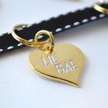 Load image into Gallery viewer, Gold Plated L&#39;il Bae Pet Tag. Our pets get 100% of our affection - which is exactly why Canadian company Boldfaced Goods decided to make these cute Lil&#39; Bae pet tags. Measures almost 1 inch in size. Shiny backing perfect for engraving their name/number. Can also be worn as a pendant necklace for humans. Gold plated zinc alloy. Wiggles and Whiskers Canada Pet Accessories.
