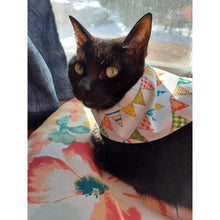 Load image into Gallery viewer, Party Bunting/Black Bird Snap-On Dog or Cat Bandana. Over the Collar style Bandana is perfect for dogs and cats on the move because once it’s on it won’t be going anywhere! Slip their collar through the top of the bandana and they can wear it in front, to the side, or at the back. Our bandanas are fully reversible for two different looks – perfect for your style conscious or messy pet. They are also double stitched to last through many washings. Canadian Pet Accessories Company Wiggles &amp; Whiskers
