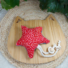 Load image into Gallery viewer, Sock Monkey Shooting Star Catnip Toy. Stimulate all your cat’s senses with this catnip toy! Star shaped flannel toy with string dangle with monkey pattern on one side. Measures 5.5” across and 11” in total length. The other side of this catnip toy is polka dot patterned in red and white. Wiggles &amp; Whiskers. Pet Accessories Canada.
